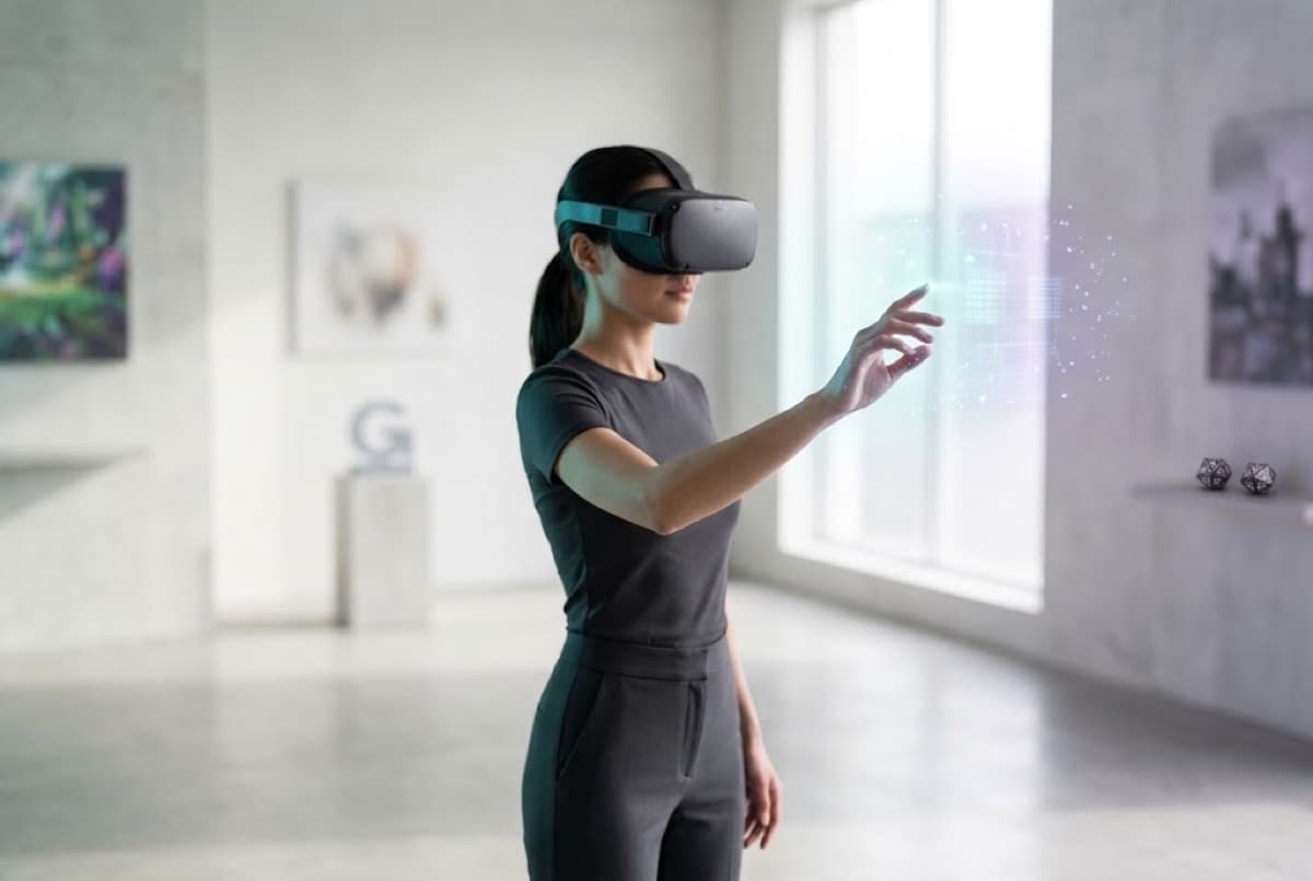 AR/VR development: a person in a VR headset reaching for a virtual object
