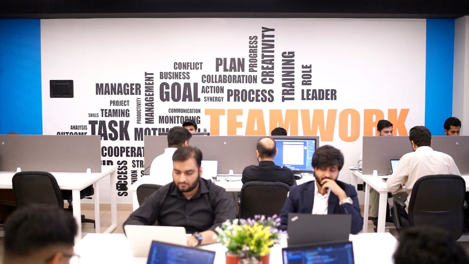 The Webtronix team at work in the Islamabad office